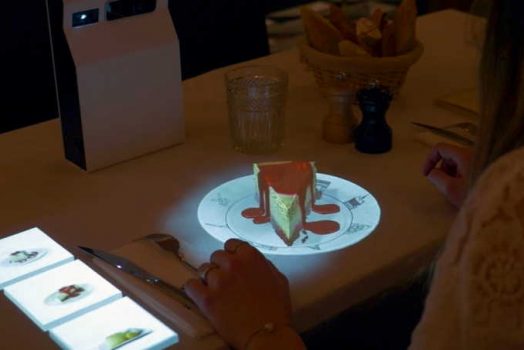 Is it modern to use holograms for customers in restaurants?